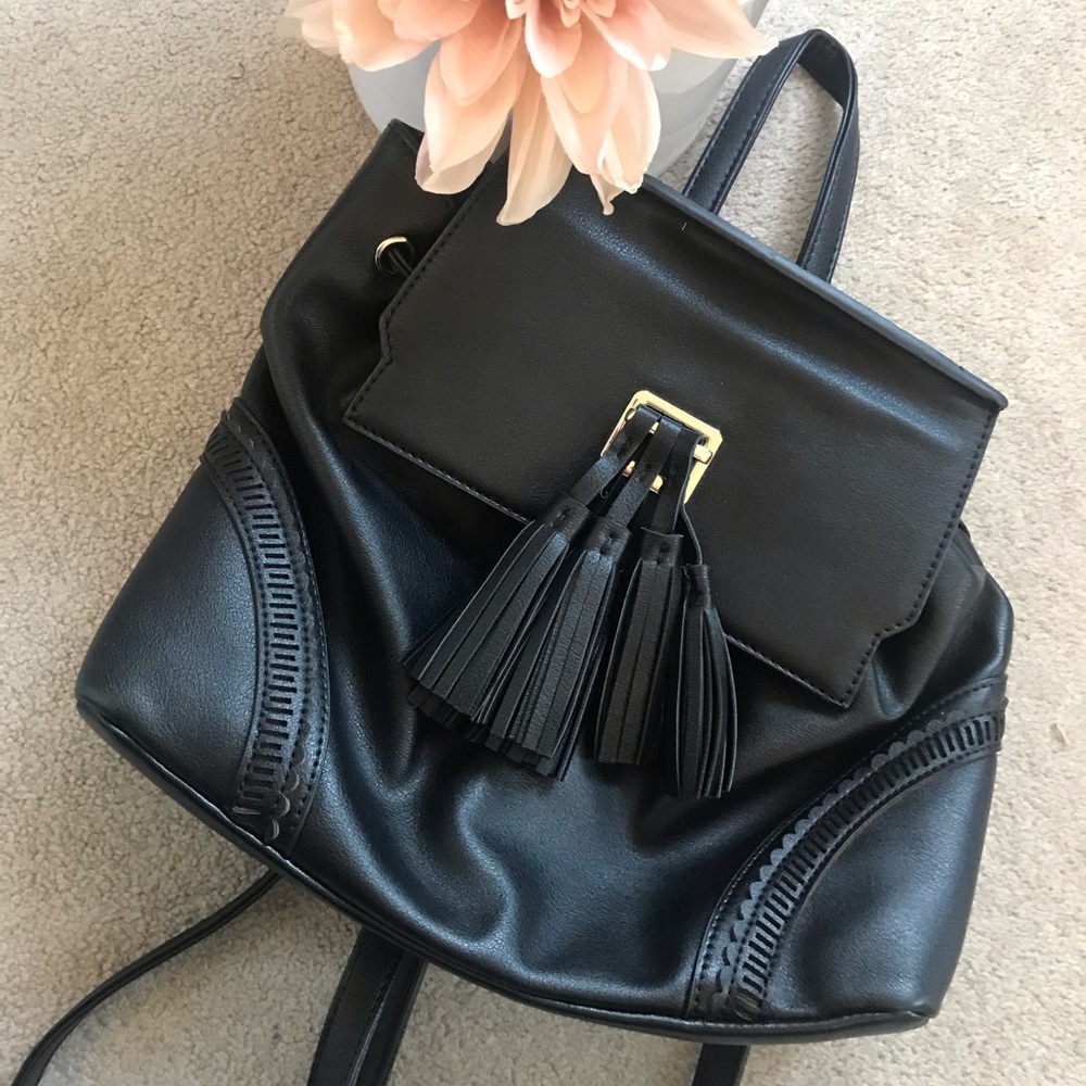 Lionel Faux Leather Backpack Purse